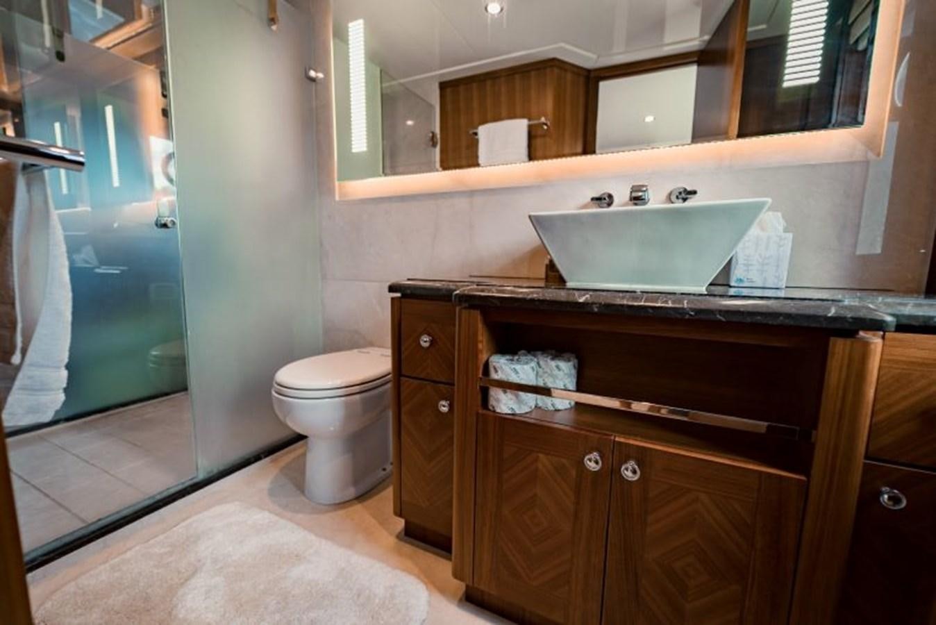 a bathroom with a sink and a toilet aboard SWEET SALT Yacht for Sale