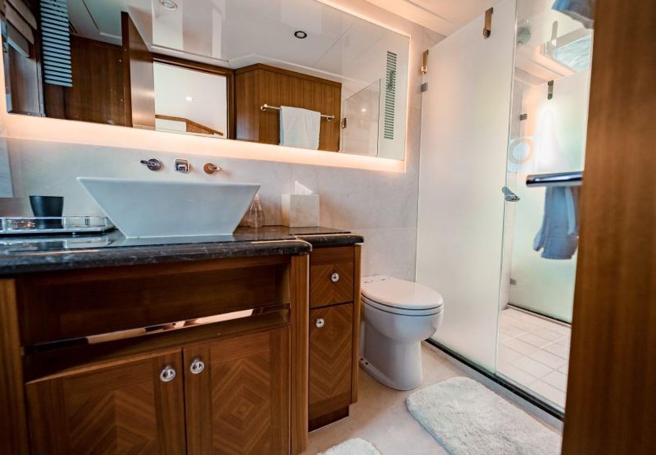 a bathroom with a sink and a toilet aboard SWEET SALT Yacht for Sale