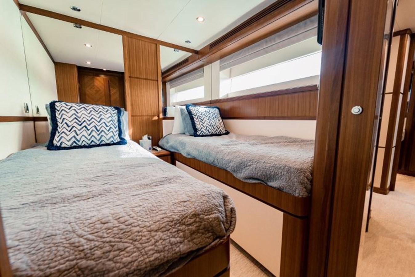 a couple of beds in a room aboard SWEET SALT Yacht for Sale