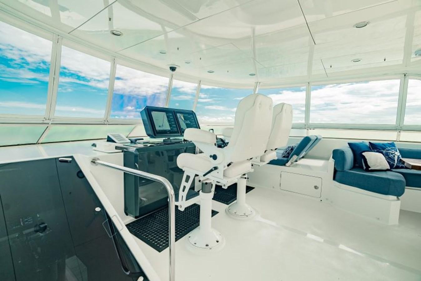 a room with a large window aboard SWEET SALT Yacht for Sale