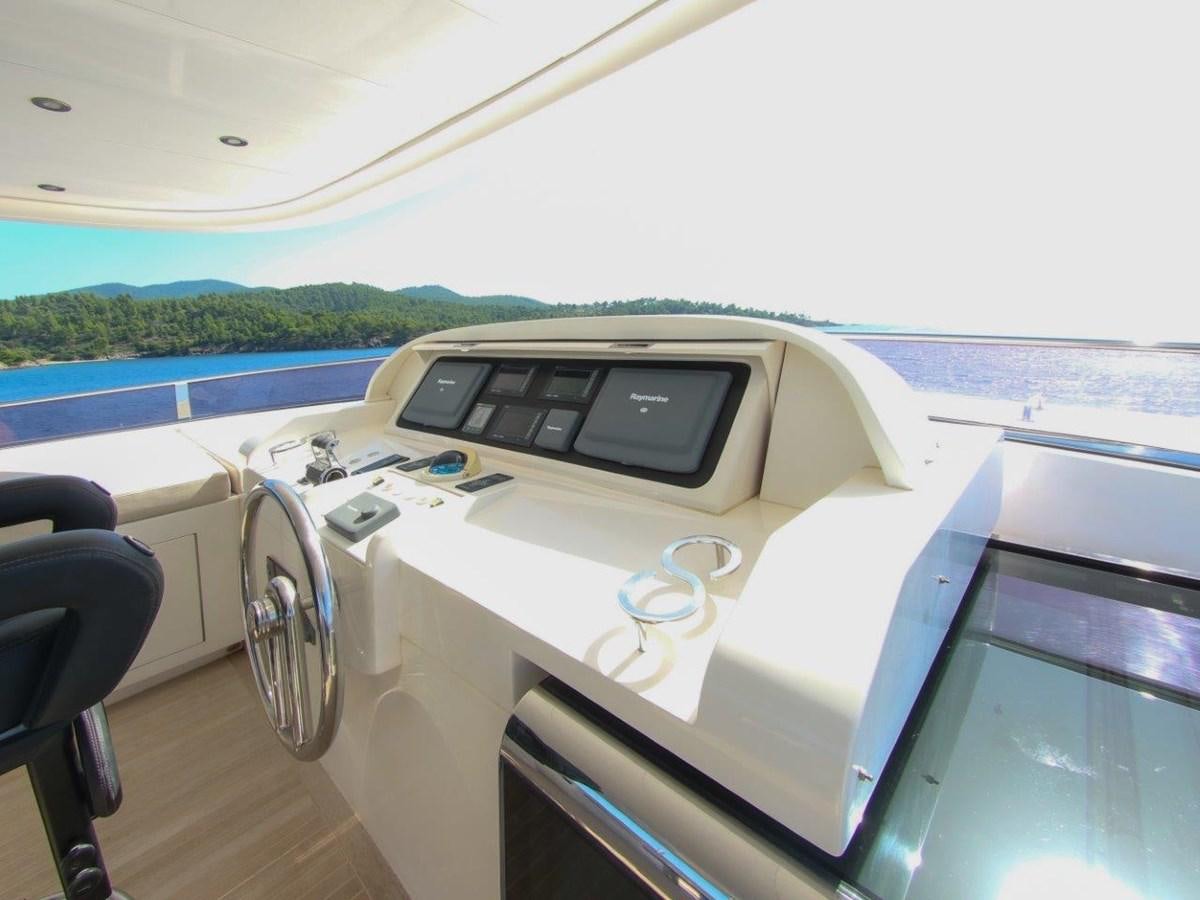 inside of a car aboard POCO LOCO Yacht for Sale