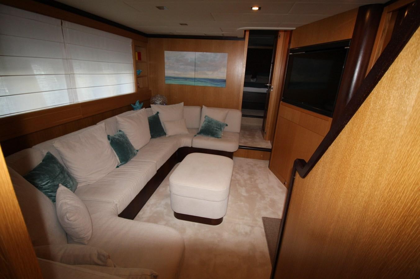 a room with a bed and a couch aboard LE.ONE Yacht for Sale