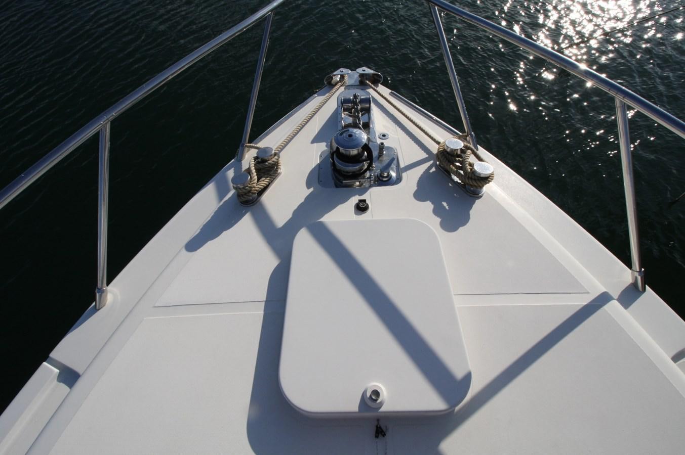 a white and blue building with a snowman on it aboard LE.ONE Yacht for Sale