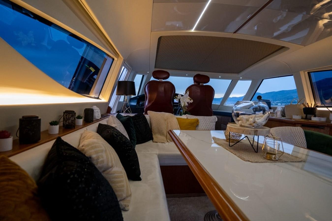 a room with a large mirror aboard F68 Yacht for Sale