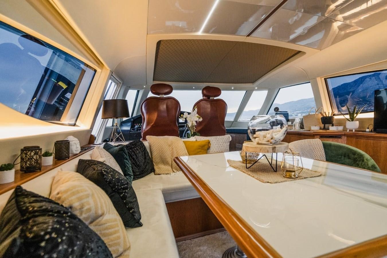 a room with a large mirror aboard F68 Yacht for Sale