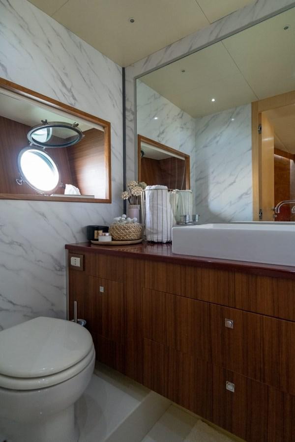 a bathroom with a sink and toilet aboard F68 Yacht for Sale