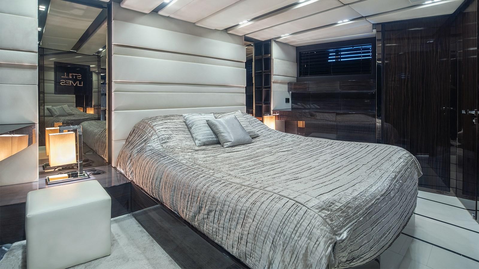 a bed in a room aboard GIGRECA Yacht for Sale