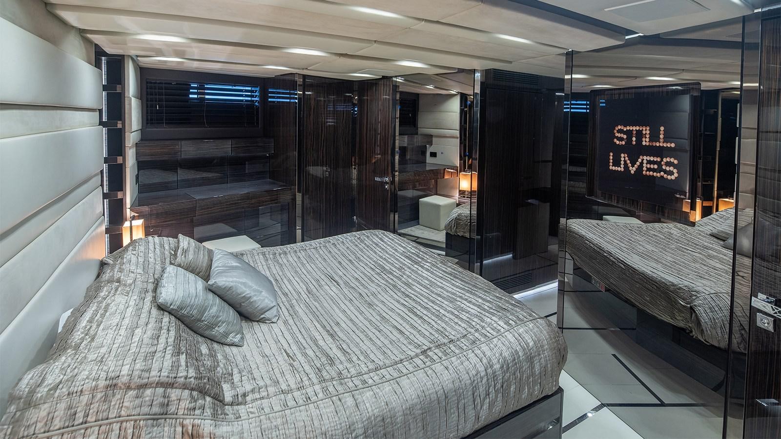 a hotel room with a bed aboard GIGRECA Yacht for Sale