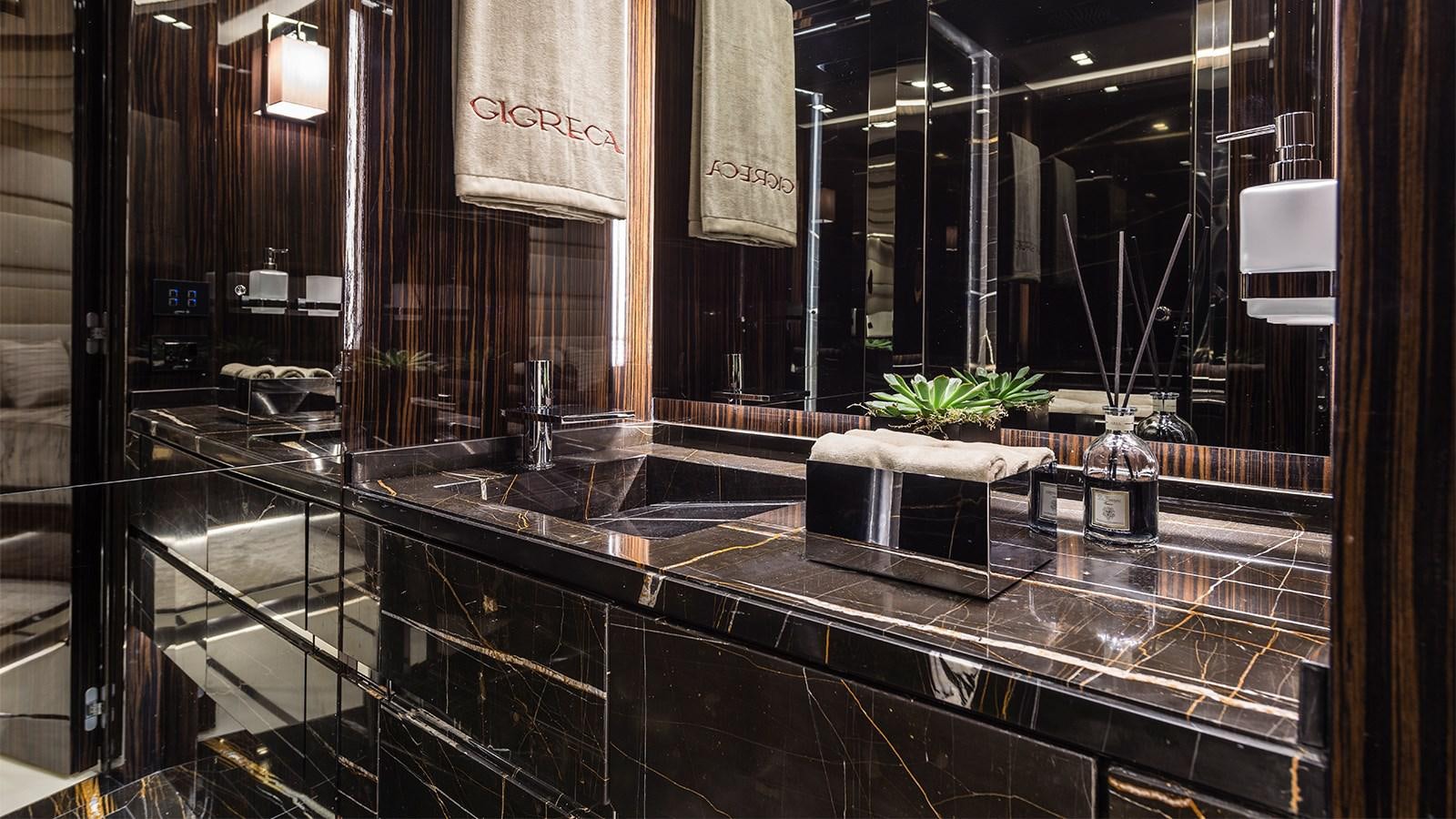 a large kitchen with a large counter aboard GIGRECA Yacht for Sale