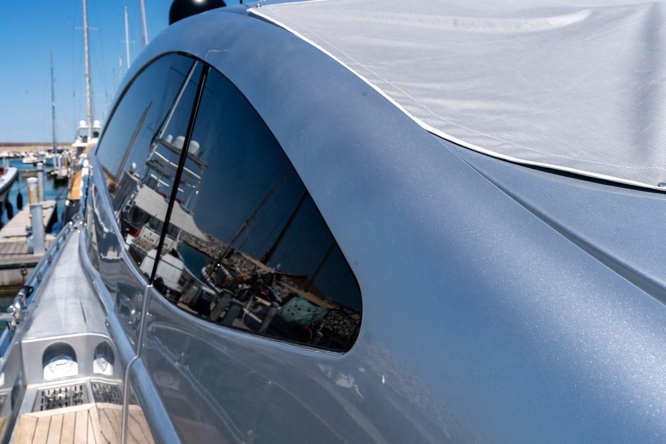 a large boat with a large mirror aboard APHRODITE Yacht for Sale