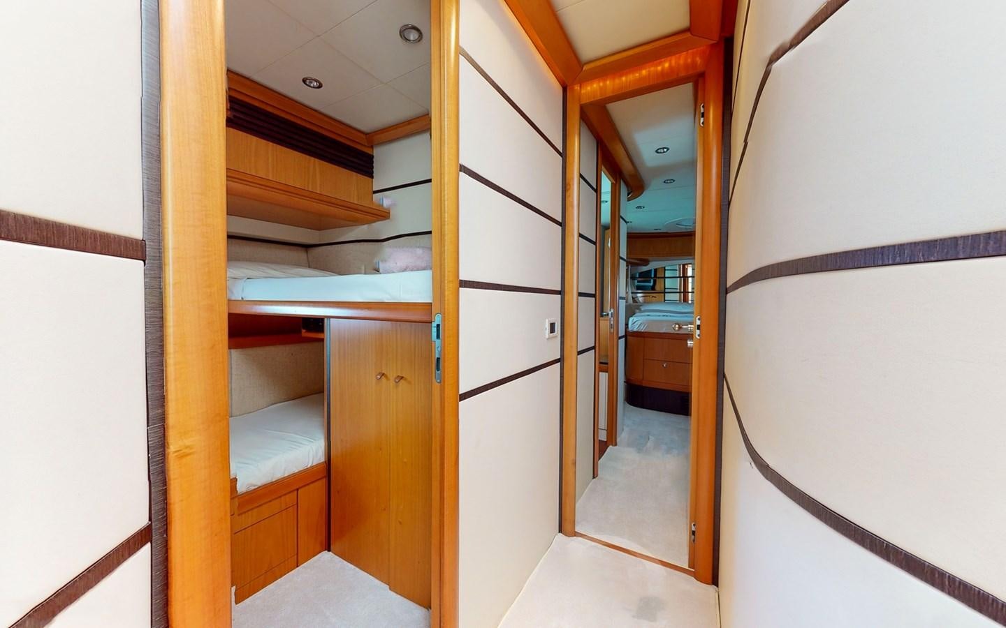 a room with wooden cabinets aboard APHRODITE Yacht for Sale