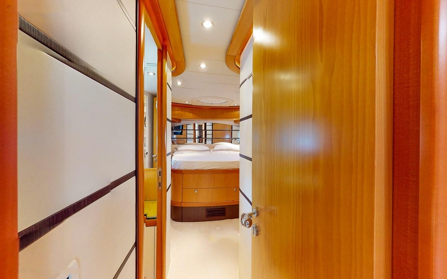 a bathroom with a closet and bunk beds aboard APHRODITE Yacht for Sale