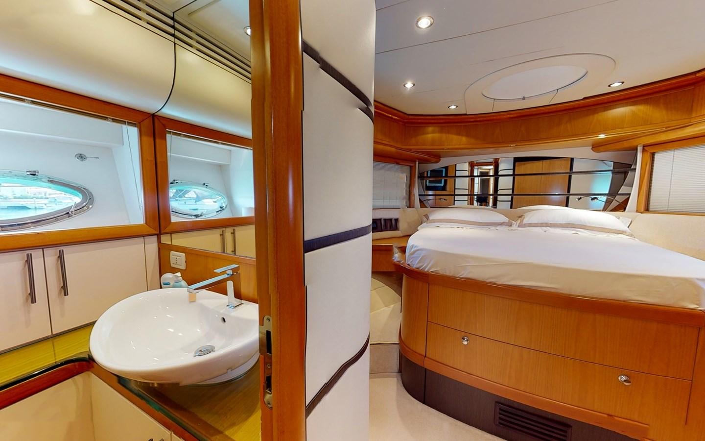 a bathroom with a sink and a mirror aboard APHRODITE Yacht for Sale