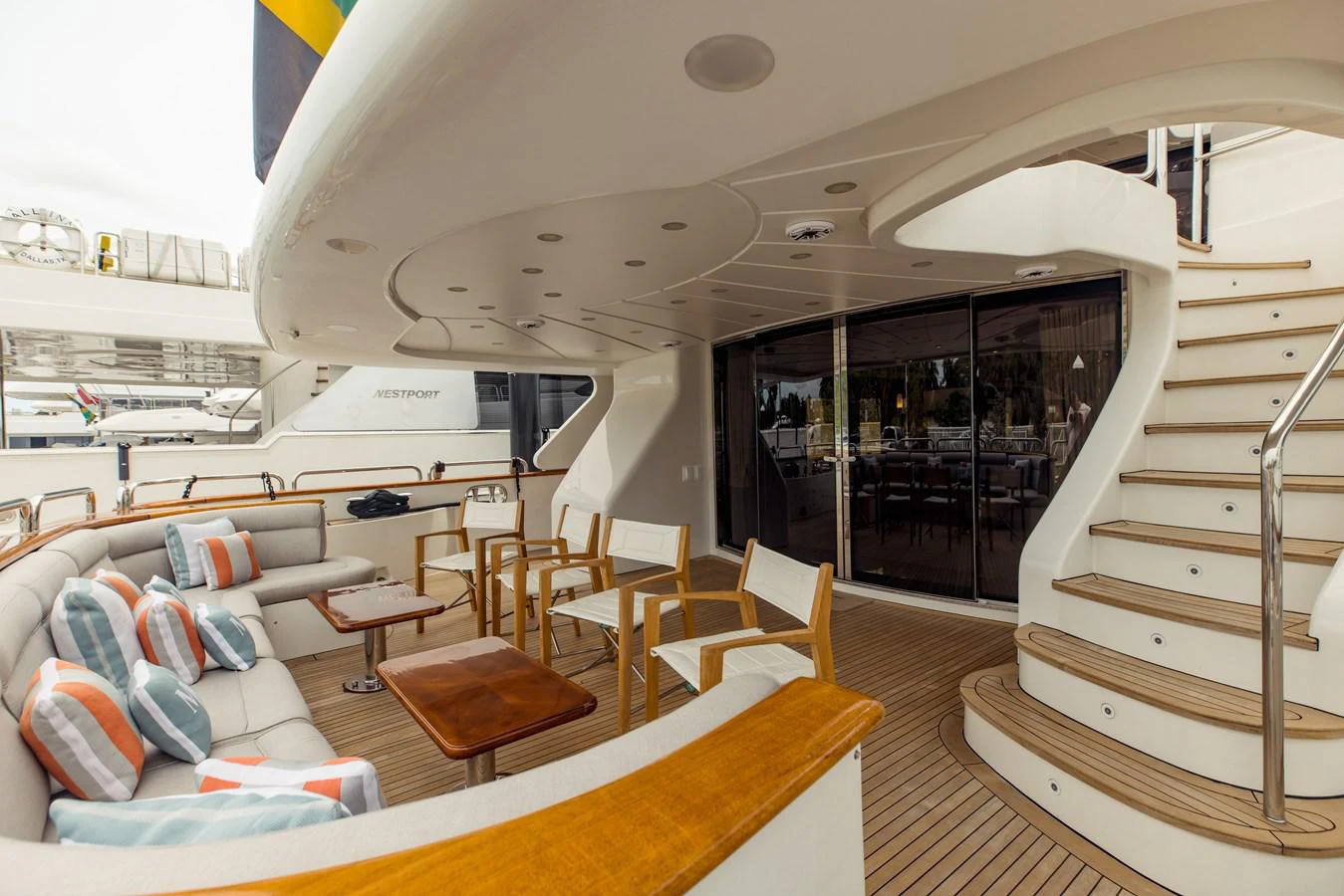 a room with a couch and a staircase aboard MAMMA MIA Yacht for Sale