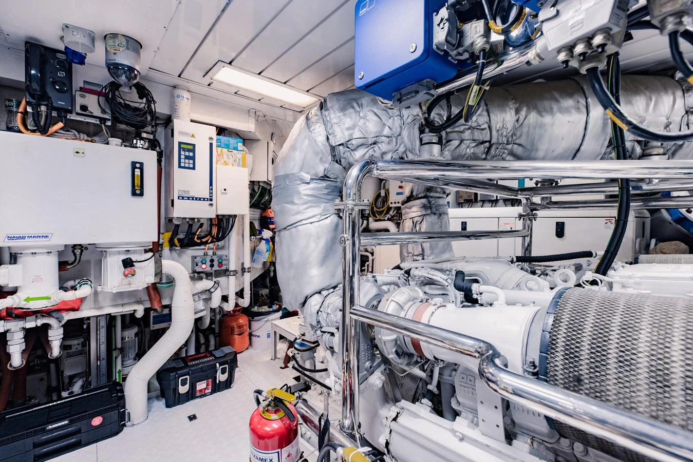 a room with several machines aboard MAMMA MIA Yacht for Sale
