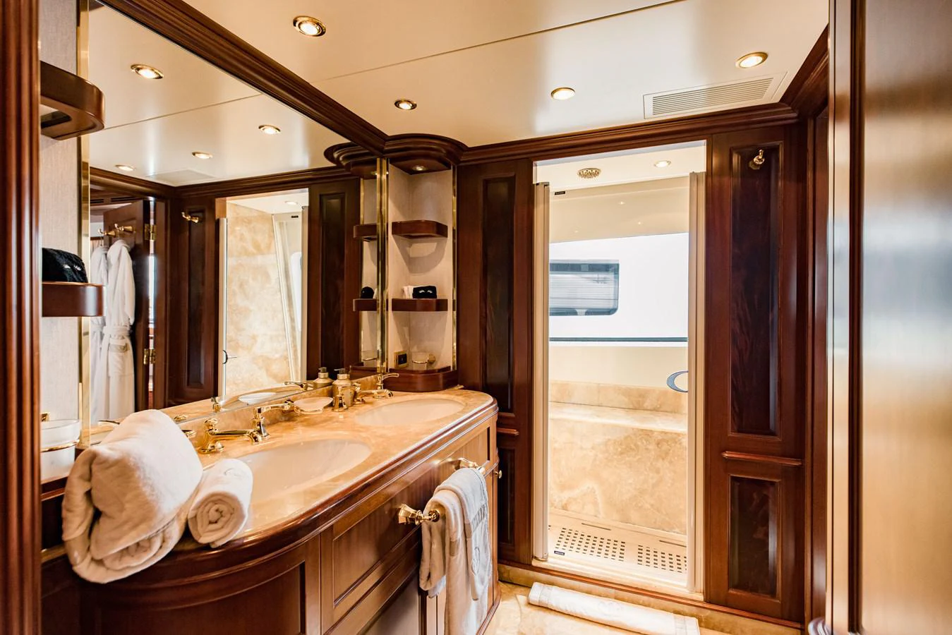a bathroom with a large mirror aboard MAMMA MIA Yacht for Sale