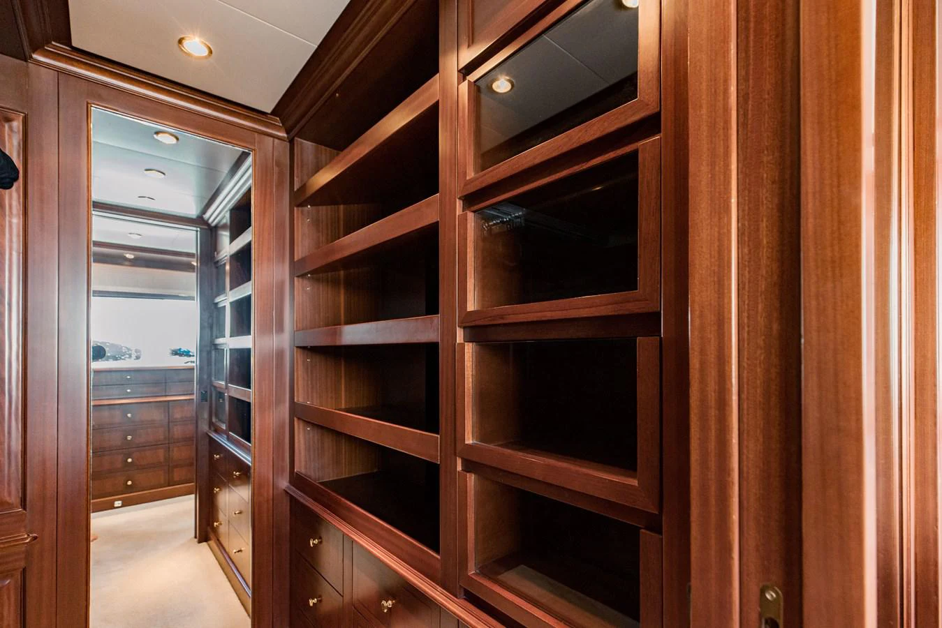 a room with wooden cabinets aboard MAMMA MIA Yacht for Sale