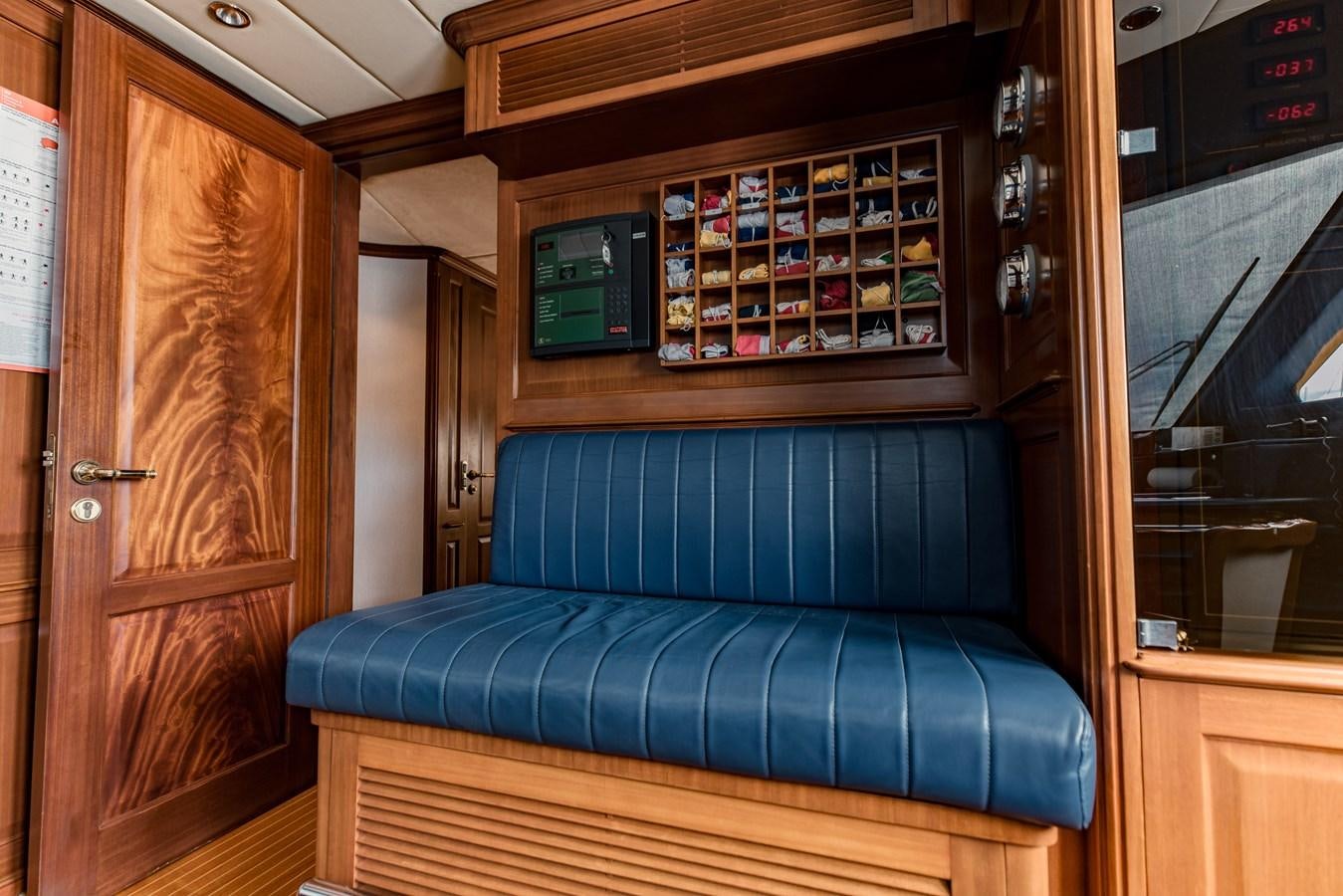 a couch in a room aboard MAMMA MIA Yacht for Charter