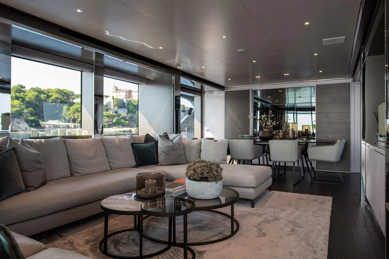 a living room with a couch and a coffee table aboard O4 Yacht for Sale