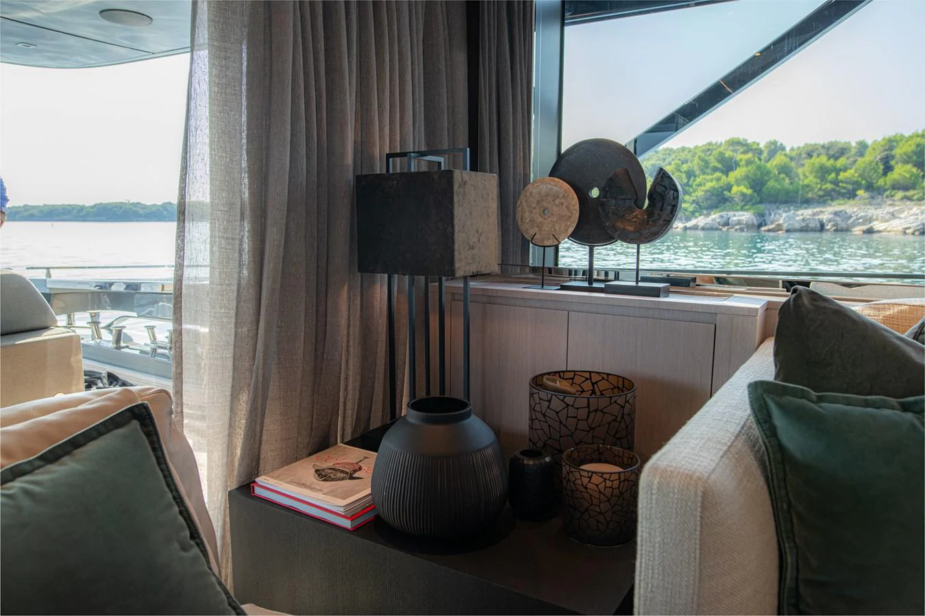 a room with a table and chairs aboard O4 Yacht for Sale