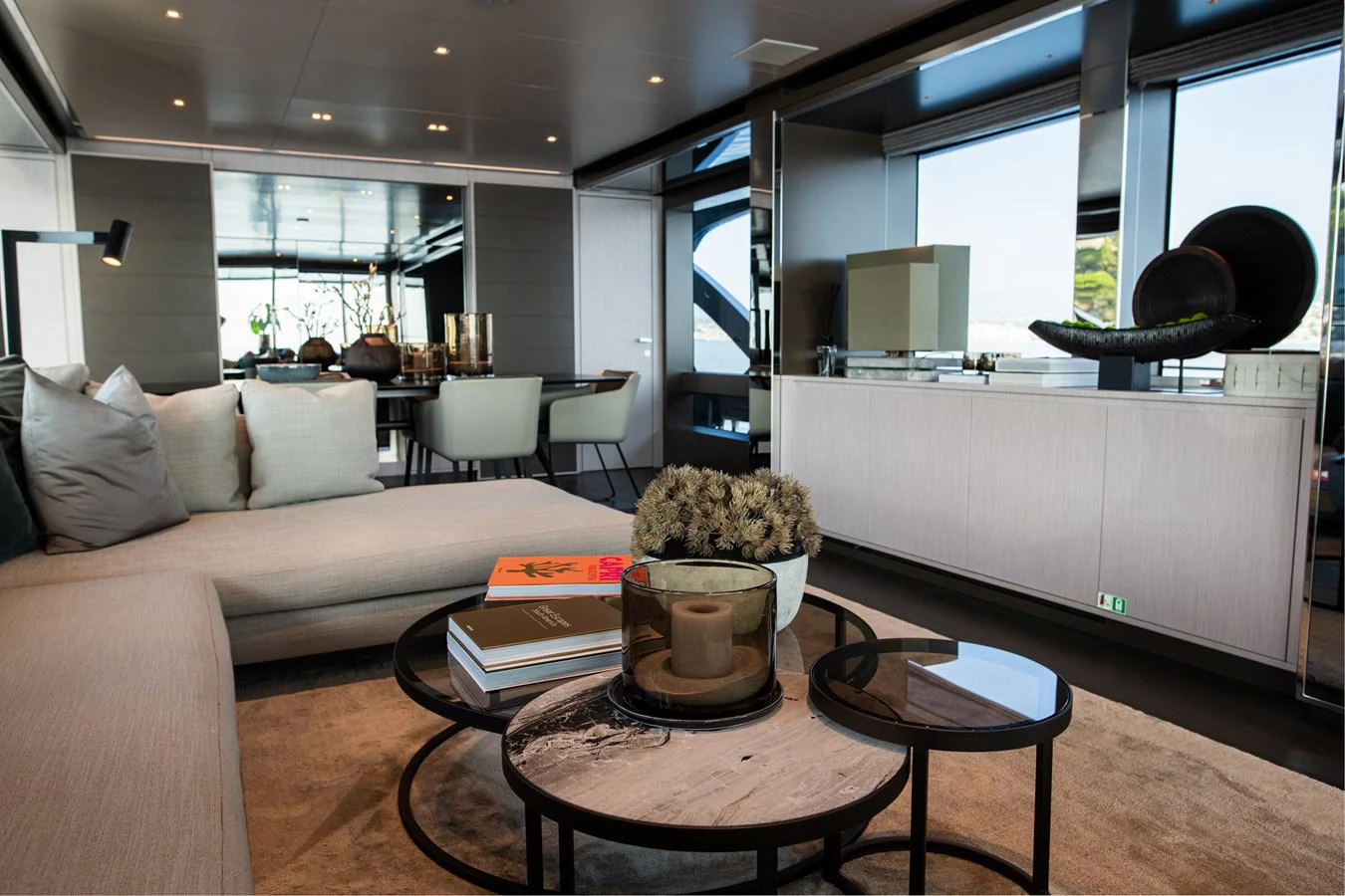 a living room with a couch and coffee table aboard O4 Yacht for Sale