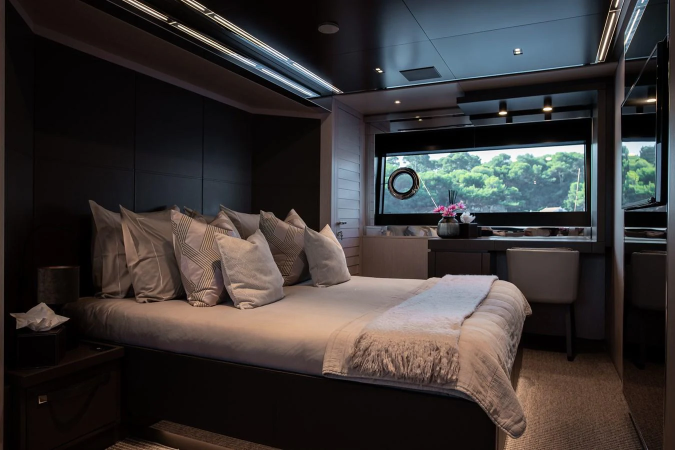 a bed in a room aboard O4 Yacht for Sale