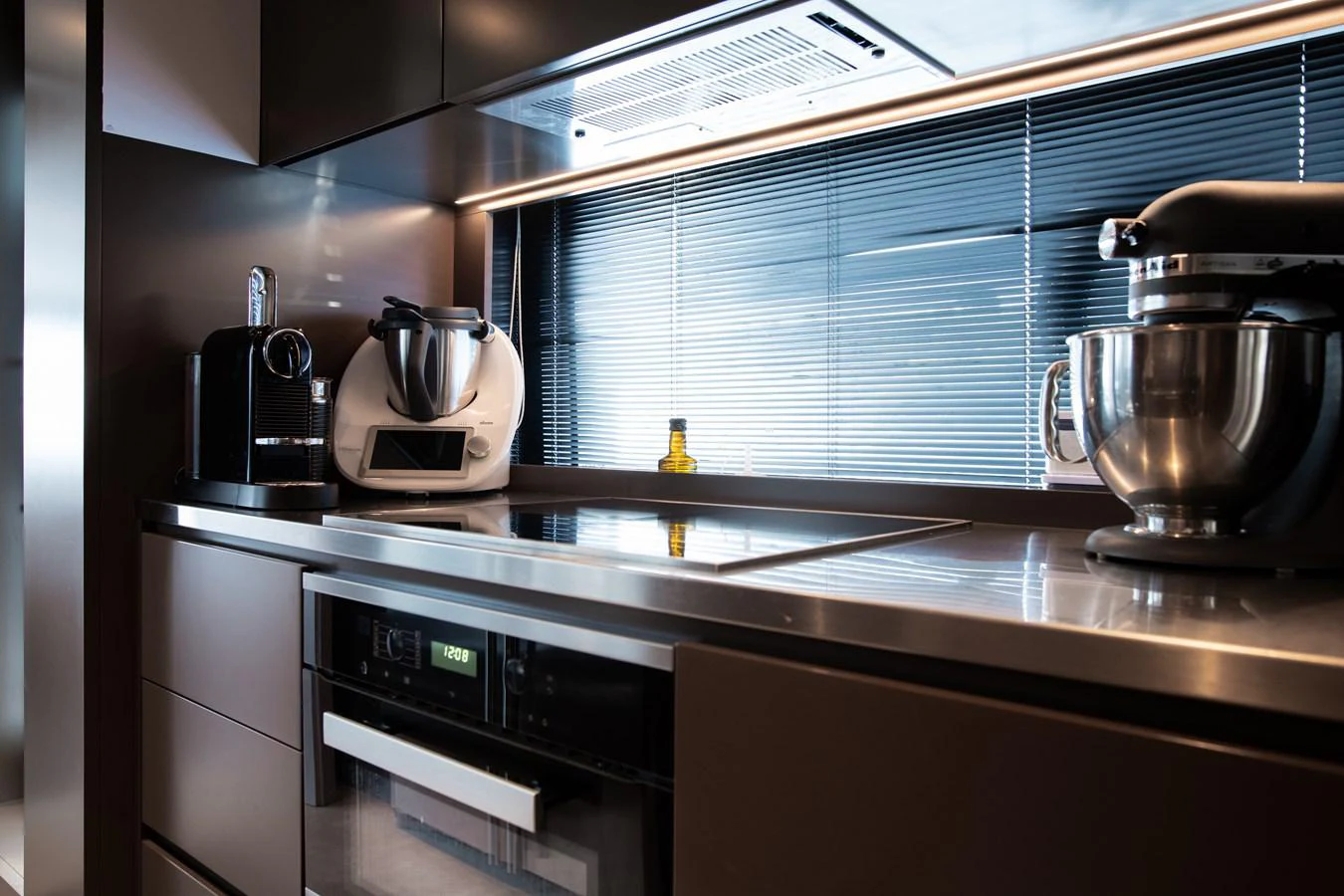 a coffee maker on a counter aboard O4 Yacht for Sale