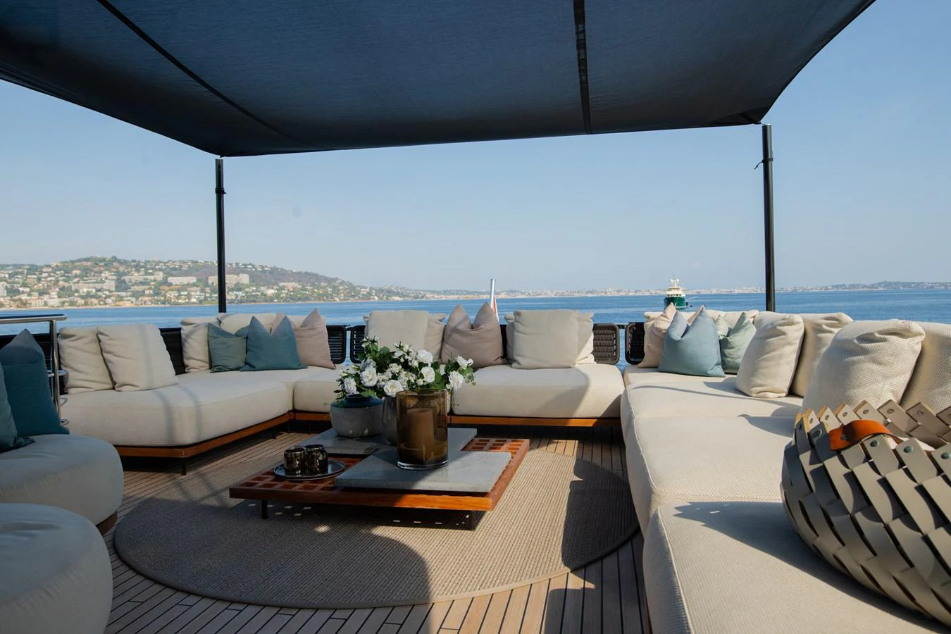 a living room with a large window aboard O4 Yacht for Sale