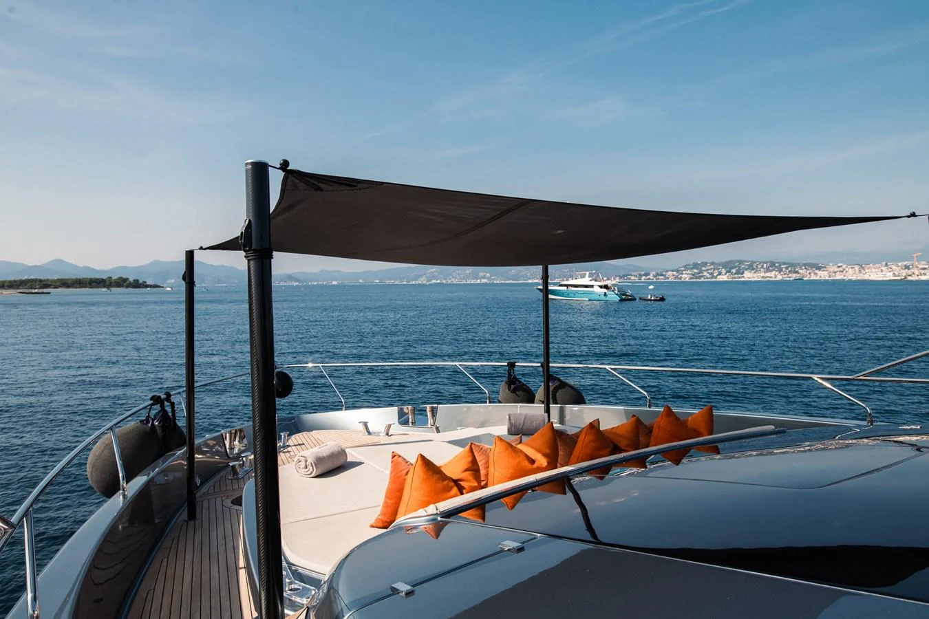 a boat with a umbrella on it aboard O4 Yacht for Sale