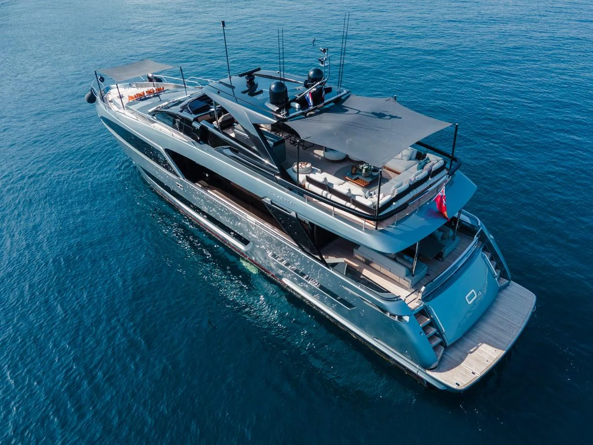 a large ship in the water aboard O4 Yacht for Sale