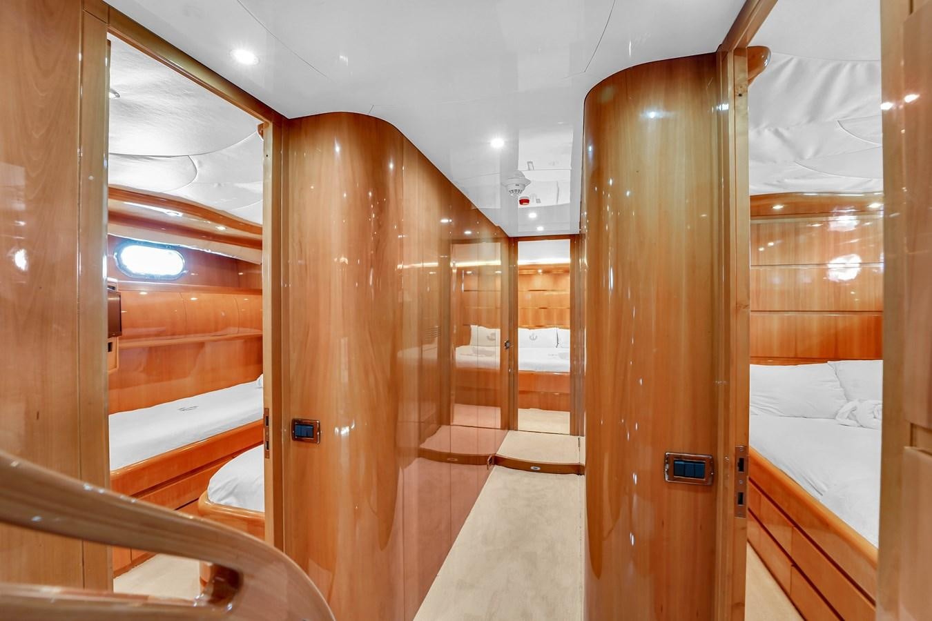 a room with wooden walls and wood floors aboard STAMOS BIEN Yacht for Sale