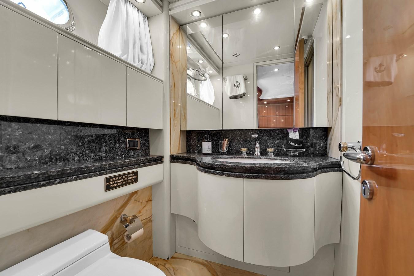 a bathroom with a large mirror aboard STAMOS BIEN Yacht for Sale