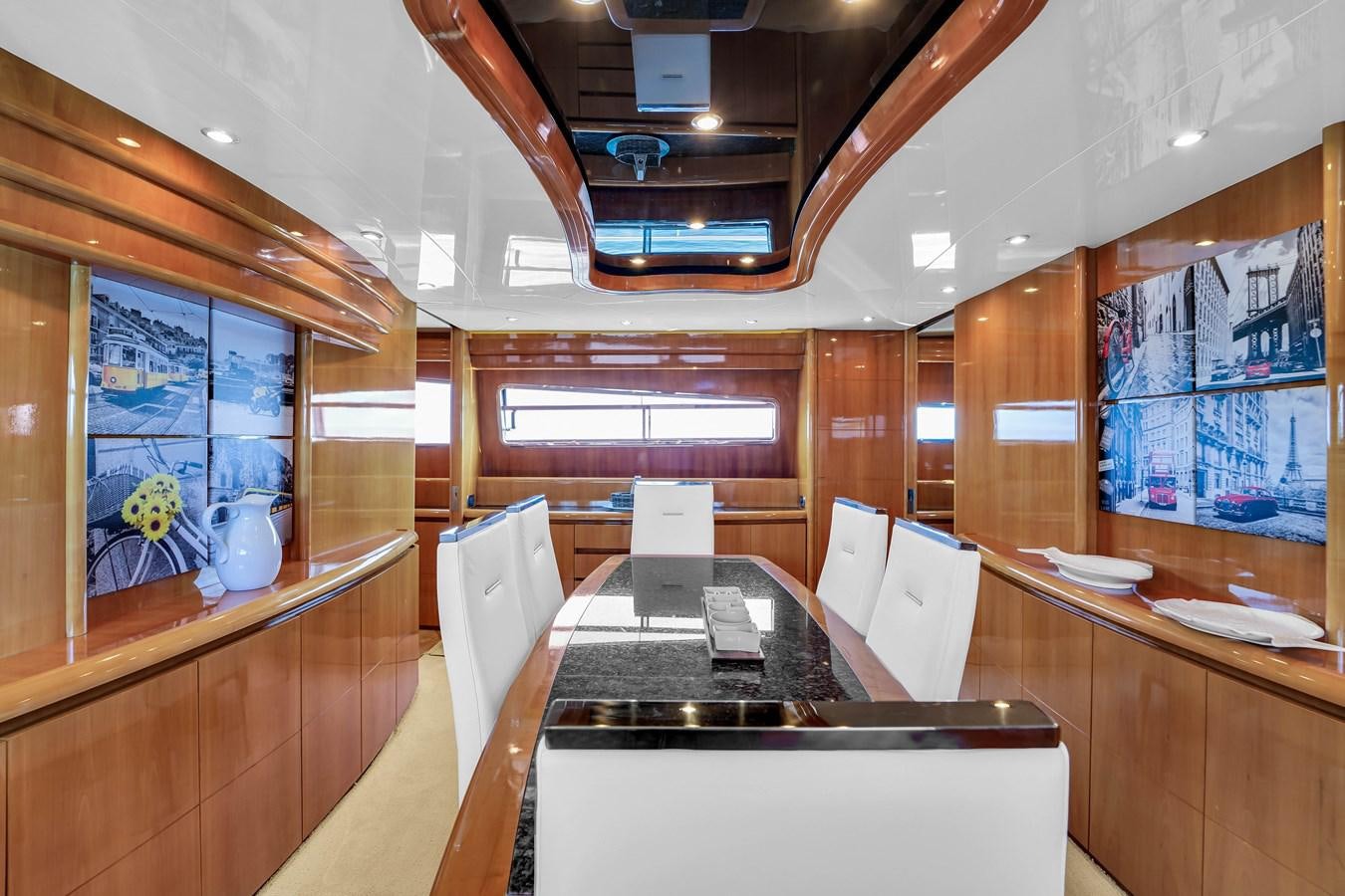 a kitchen with wooden cabinets aboard STAMOS BIEN Yacht for Sale