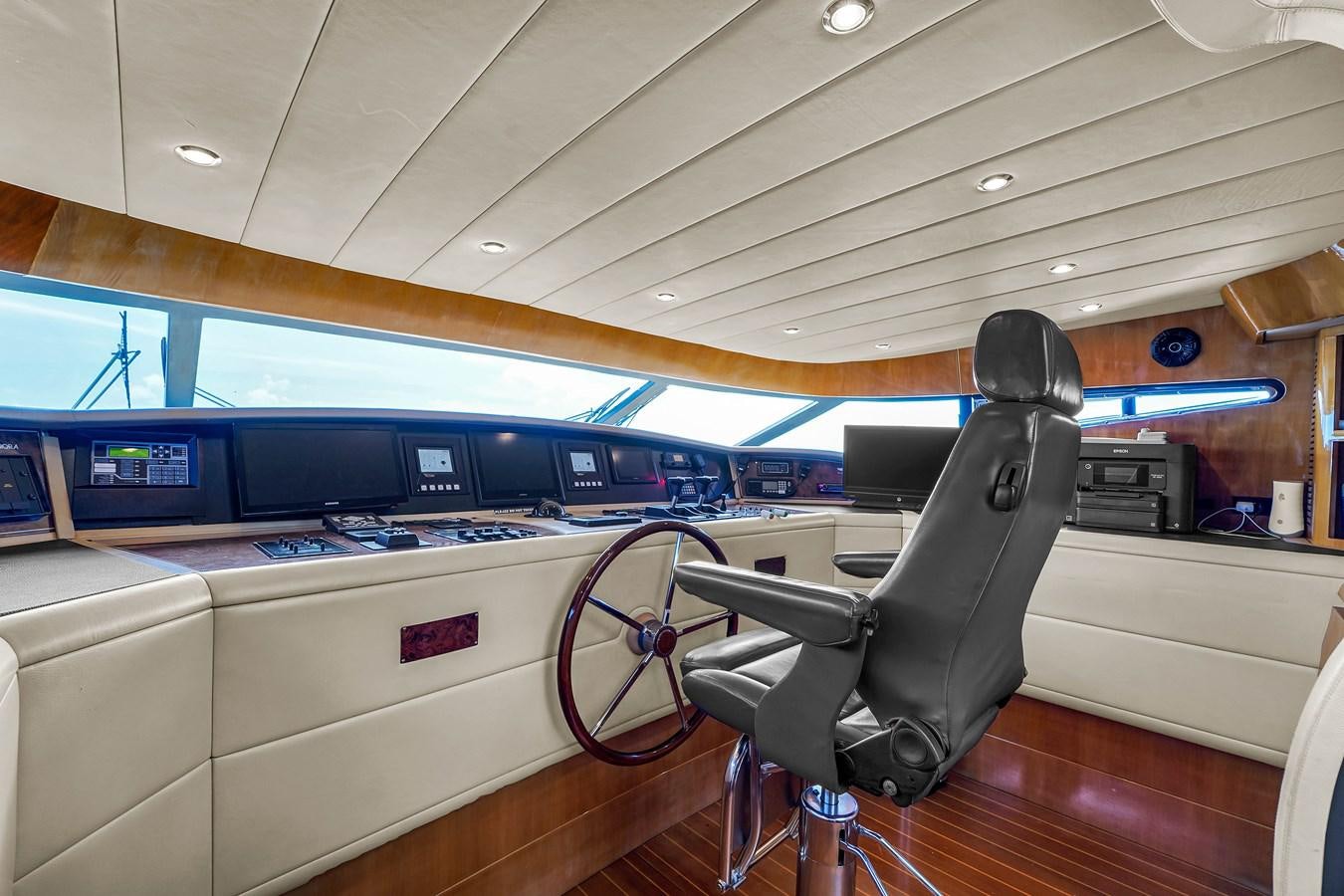 a black chair in a room aboard STAMOS BIEN Yacht for Sale