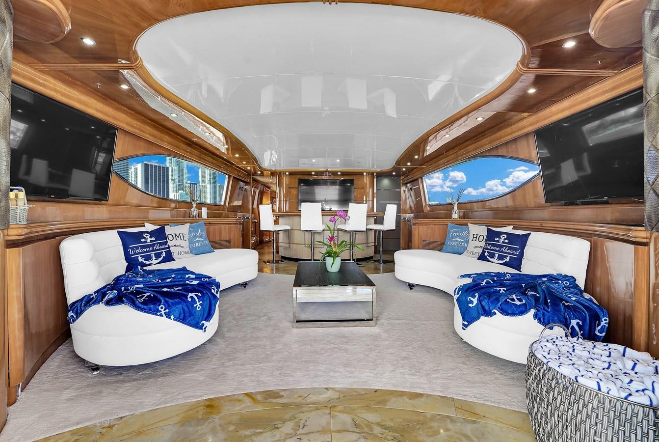 a room with a bed and a television aboard STAMOS BIEN Yacht for Sale