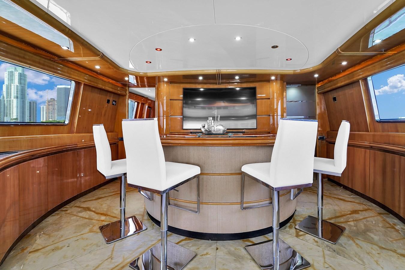 a room with chairs and a table aboard STAMOS BIEN Yacht for Sale
