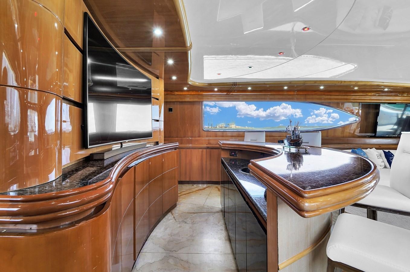 a room with a table and chairs aboard STAMOS BIEN Yacht for Sale