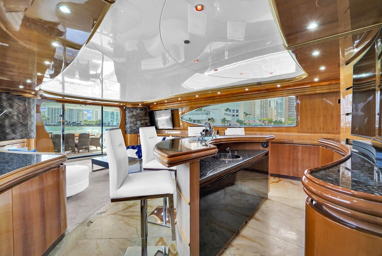 a large room with a piano and a piano aboard STAMOS BIEN Yacht for Sale