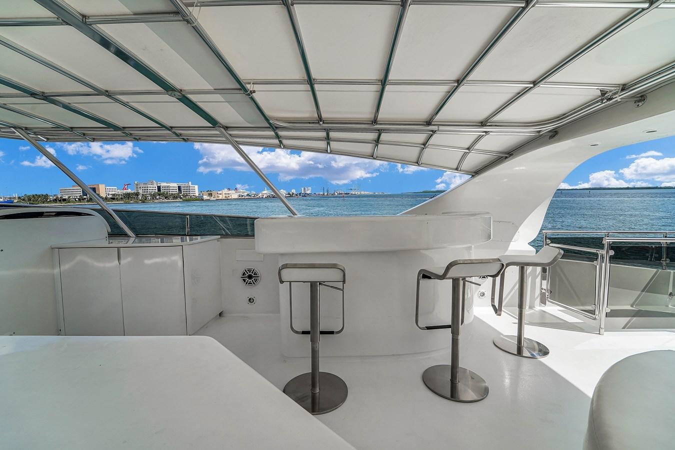 a white boat with a railing aboard STAMOS BIEN Yacht for Sale