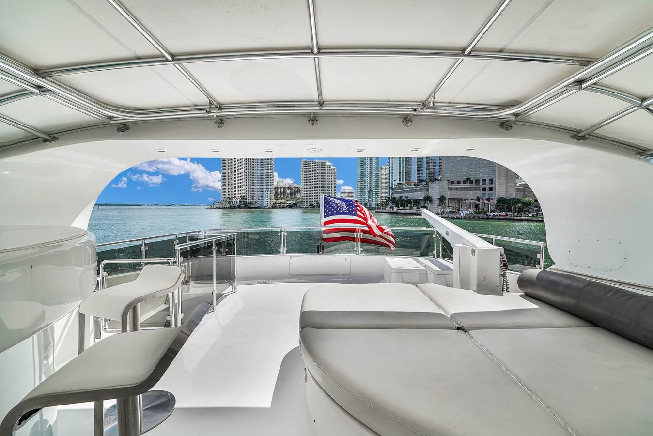 a boat with a flag on the deck aboard STAMOS BIEN Yacht for Sale
