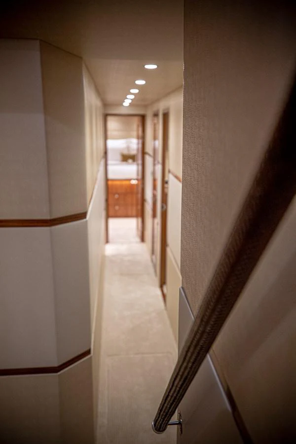 a hallway with white walls aboard SPECULATOR Yacht for Sale