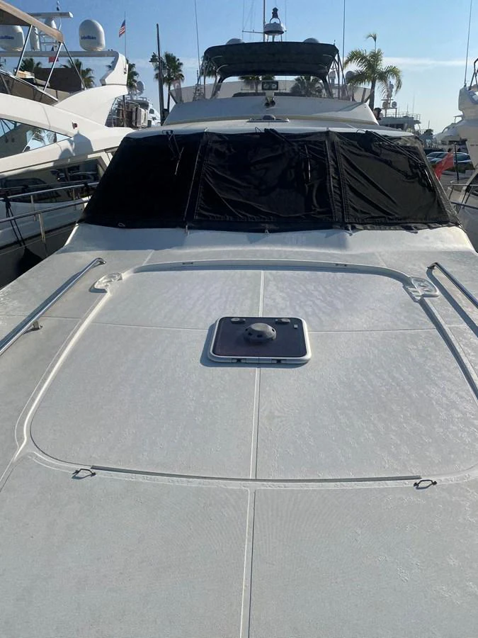 a white car with a black hood aboard AMADEUS Yacht for Sale
