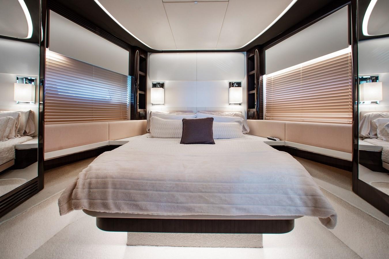 a room with a bed and a window aboard ROLLING LOUD Yacht for Sale