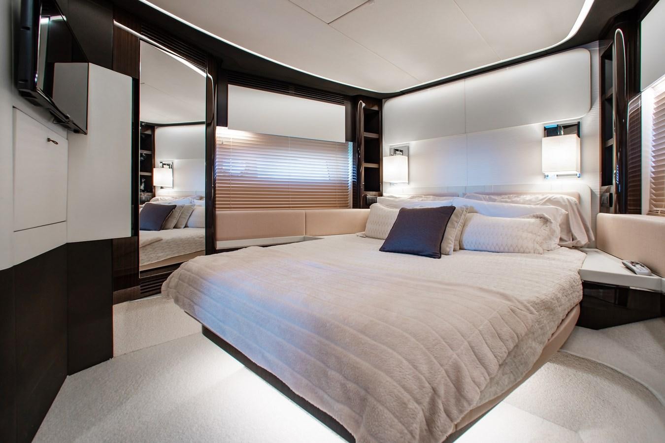 a room with a bed and a window aboard ROLLING LOUD Yacht for Sale