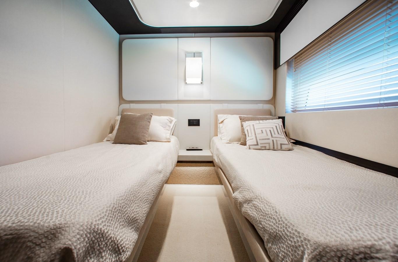 a couple of beds in a room aboard ROLLING LOUD Yacht for Sale