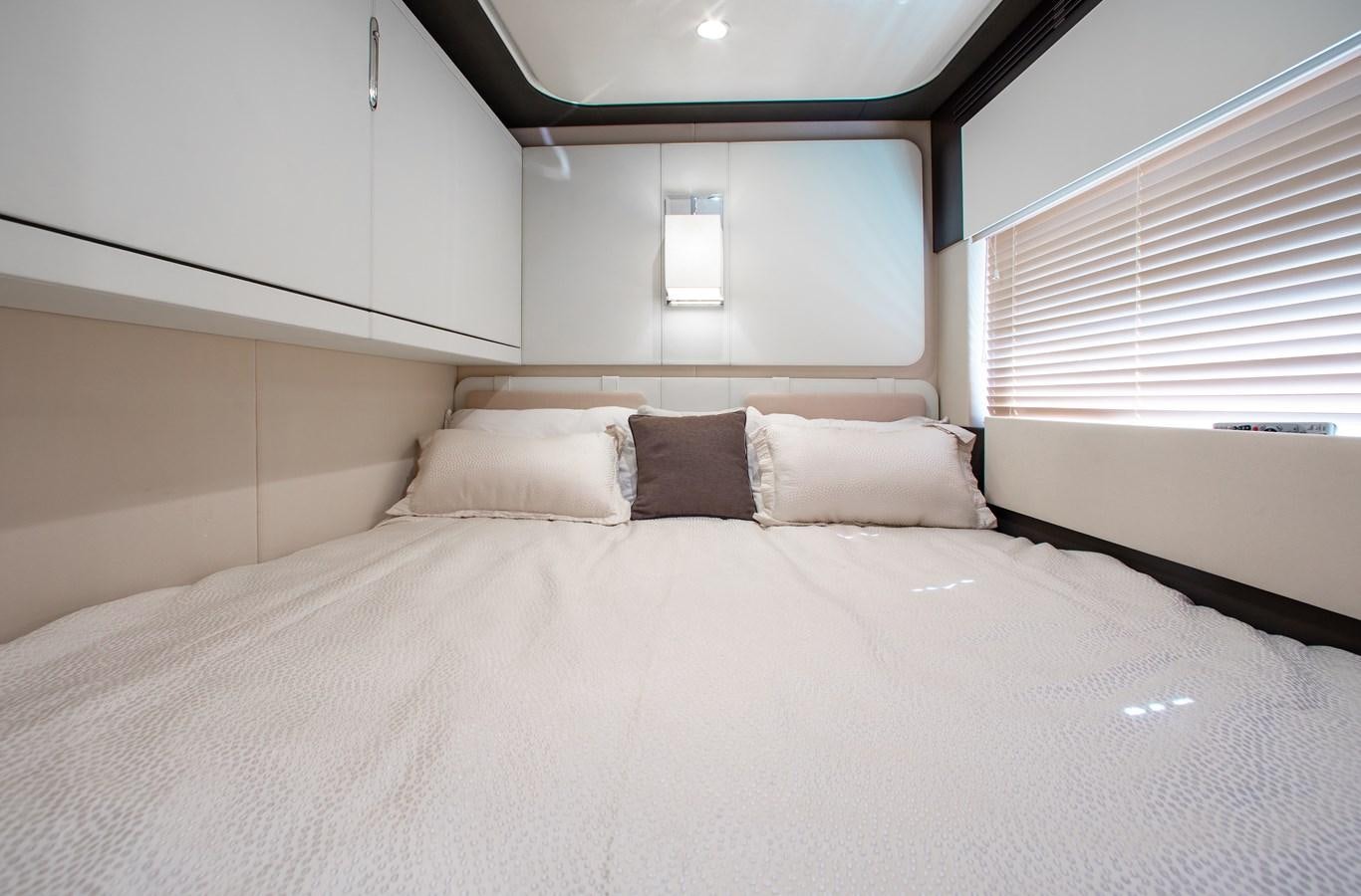 a bed with white sheets aboard ROLLING LOUD Yacht for Sale