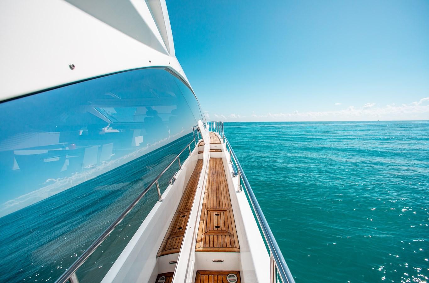 a long wooden bridge over water aboard ROLLING LOUD Yacht for Sale