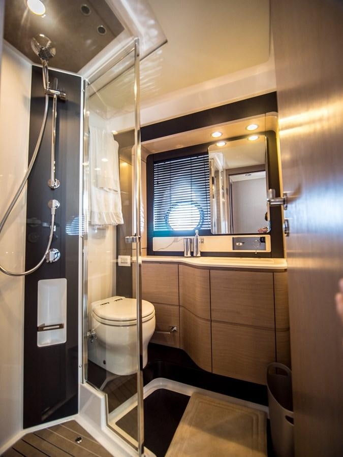 a bathroom with a shower unit aboard EVADO Yacht for Sale