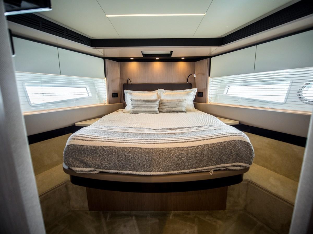a bed in a room aboard EVADO Yacht for Sale