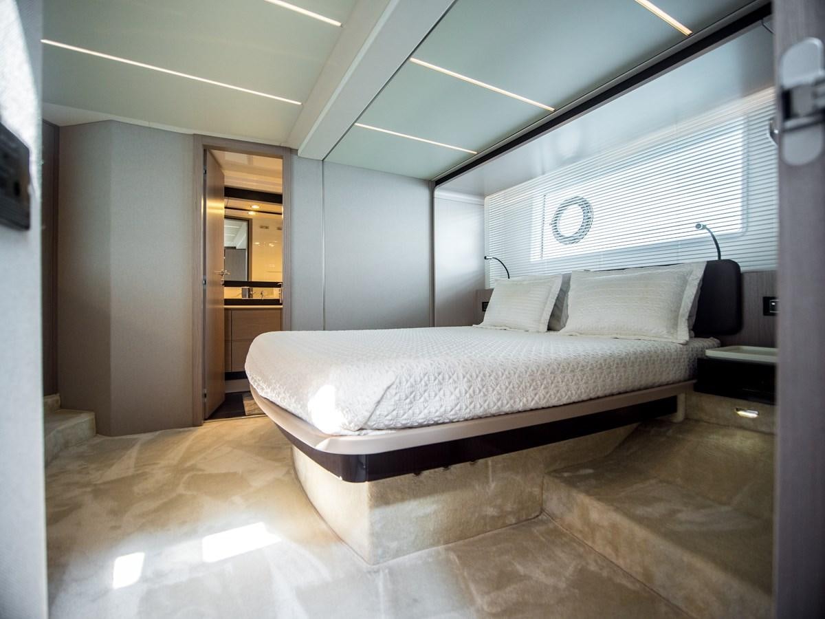 a bed in a room aboard EVADO Yacht for Sale